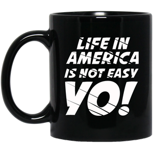 Life In America Is Not Easy Yo 11 oz. Black Mug